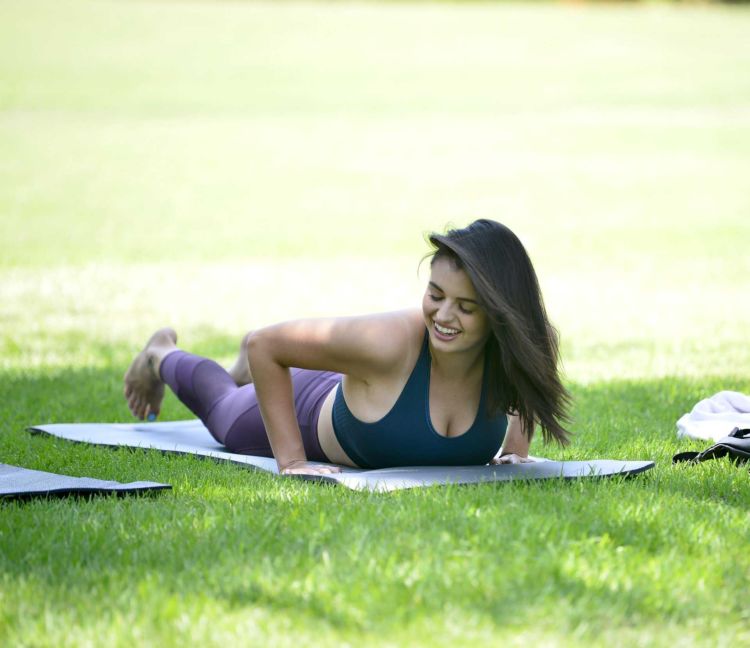 Pretty Rebecca Black Practicing Yoga In A Park