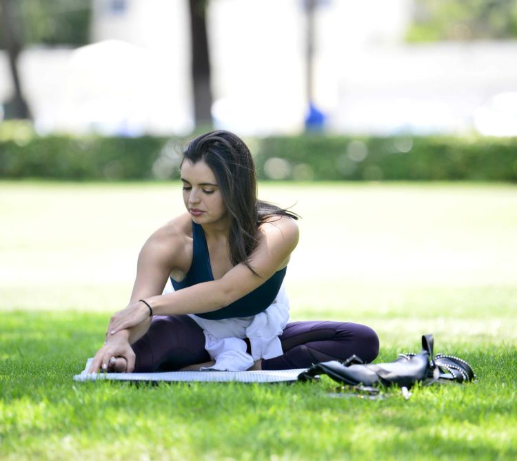 Pretty Rebecca Black Practicing Yoga In A Park