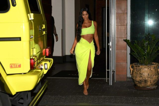 Kim Kardashian Shows Her Love For Yellow In Miami Page 2