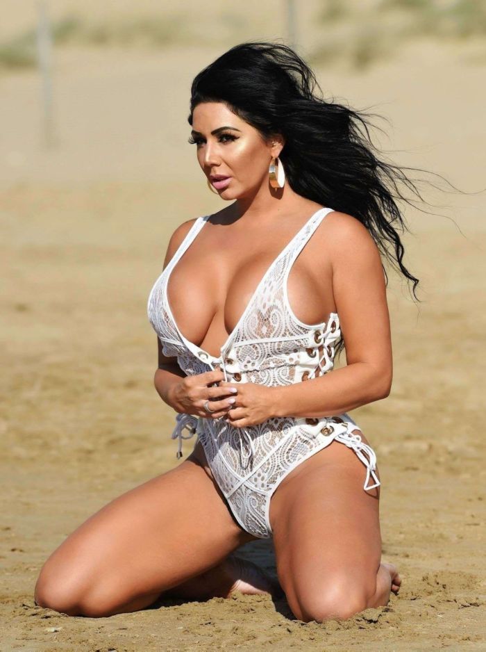 Grace J Teal Poses In A White Lingerie Bikini At A Beach