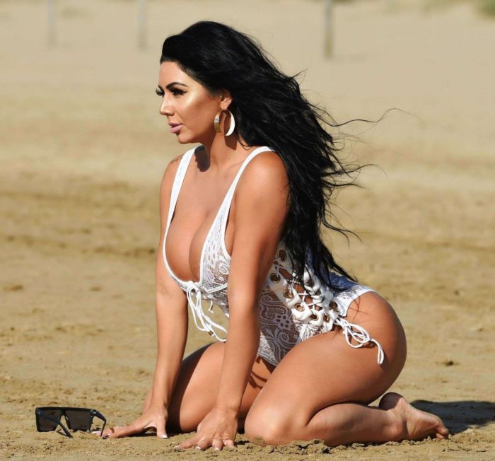 Grace J Teal Poses In A White Lingerie Bikini At A Beach