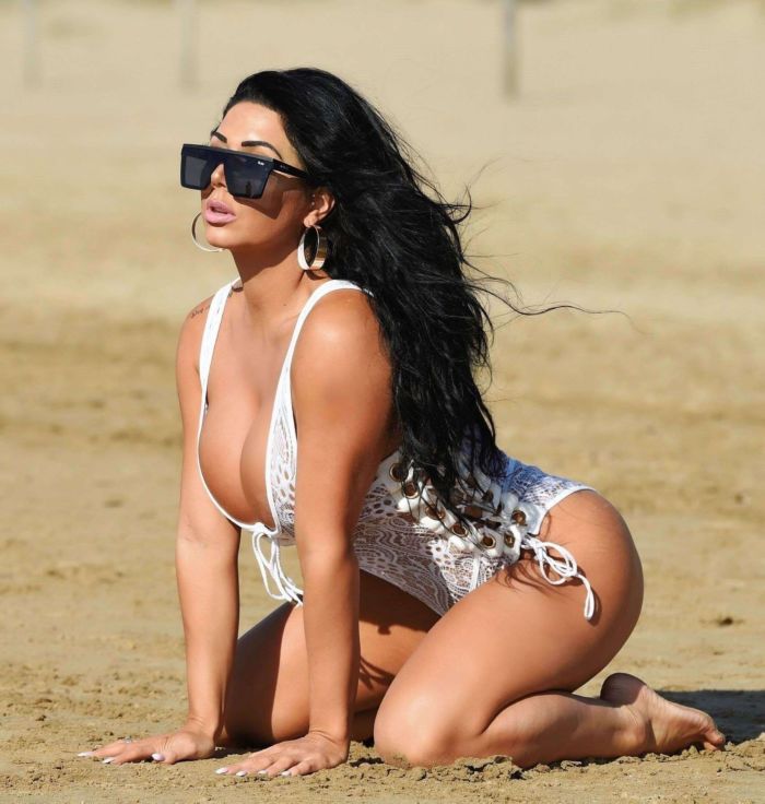 Grace J Teal Poses In A White Lingerie Bikini At A Beach