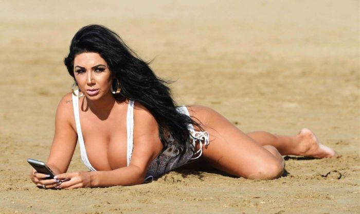 Grace J Teal Poses In A White Lingerie Bikini At A Beach