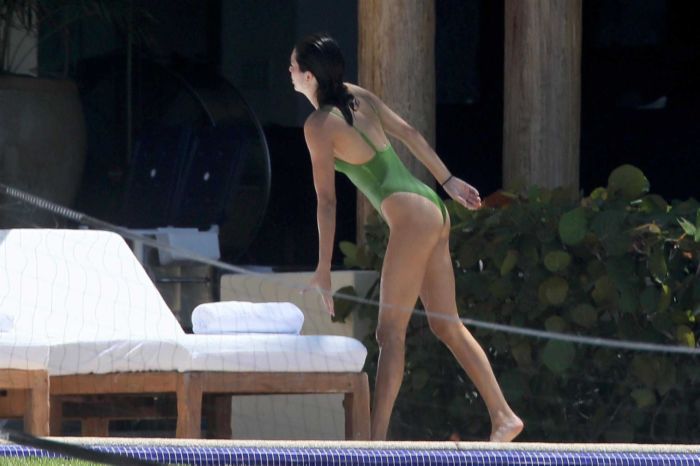 Kendall Jenner Enjoys Swimsuit Surfing In Mexico