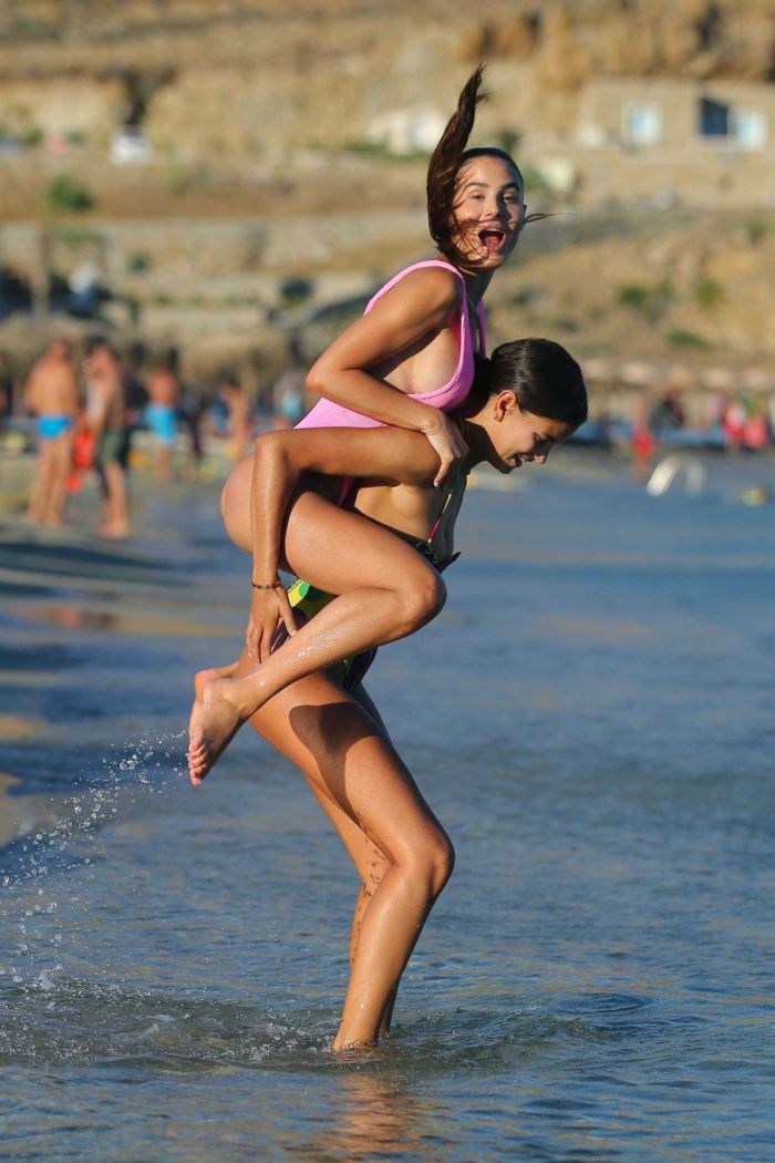 Silvia Caruso Hits The Beach In Pink Swimsuit With Her BFF